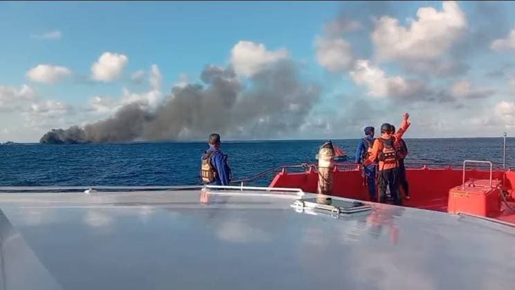 (260812) -- JAKARTA, Aug. 12, 2026 -- This photo provided by Indonesia s National Search and Rescue Agency () shows rescuers arriving at the scene after a passenger ferry caught fire in waters off Lombok island, Indonesia, Aug. 12, 2026. A passenger ferry, the Putri Yasmin, caught fire in waters off Lombok island, Indonesia s West Nusa Tenggara province, on Wednesday morning, with an estimated 130 people on board, local authorities said. The ferry was sailing from Padangbai port on the tourist island of Bali to Lembar port in Lombok when the fire broke out, according to local reports. An official in Padangbai told local media that the ferry was carrying 114 passengers and 17 crew members, based on the manifest. An evacuation operat