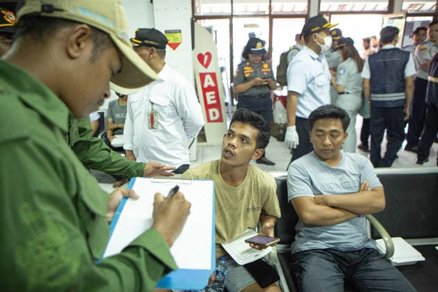 August 12, 2026, Karangasem, Bali, Indonesia: Passengers of the ferry KMP Putri Yasmin await data collection and medical examinations at the ASDP Emergency Post in Padangbai Port, Karangasem, Bali. ...A navy vessel and surrounding ships rushed to rescue 131 people onboard (114 passengers and 17 crew members) after the inter-island ferry caught fire in the Sekotong waters of the Lombok Strait at around 4:15 AM local time during its voyage to Lembar, Lombok. Authorities confirmed 35 survivors were evacuated back to Padangbai, while the remaining were transported to Lombok. One casualty was reported in the incident. Karangasem Indonesia - ZUMAp229 20260812_zip_p229_004 Copyright: xLanaxPriatnax