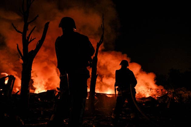 RECORD DATE NOT STATED State Emergency Service of Ukraine rescuers extinguish a large-scale fire that broke out following a massive combined Russian strike on Zaporizhzhia, Ukraine, on August 11, 2026. Overnight on August 11, Russian forces launched a massive combined strike on Zaporizhzhia, firing 10 missiles at the city, including a North Korean ballistic missile and Zircon hypersonic missiles, as well as guided aerial bombs (KABs). The attack completely destroyed the State Center for Standardization, Metrology and Certification and damaged or destroyed a number of industrial facilities and civilian infrastructure sites, including food establishments, four apartment buildings and a garage cooperative, where the blast wave demolished garages and dozens of vehicl  Copyright: xDmytroxSmolienkox