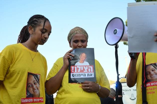 August 12, 2026, Tel Aviv, Israel: TEL AVIV, ISRAEL Ã¢â‚¬ AUGUST 12, 2026: Protesters gather outside the offices of the Israel Security Agency (Shin Bet) to mark 900 days since the abduction of Heymanot Kasau in Tel Aviv, Israel, August 12, 2026. Demonstrators call for answers from the authorities and renewed efforts in the ongoing search for Kasau, whose disappearance remains unresolved. Tel Aviv Israel - ZUMAq101 20260812_zna_q101_150 Copyright: xPaulinaxPatimerx