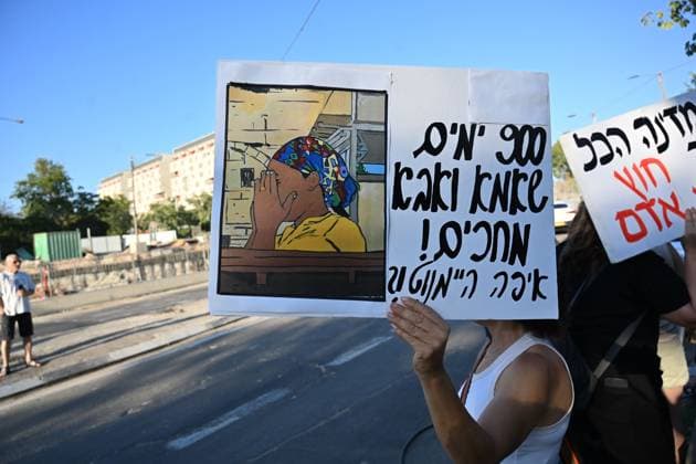 August 12, 2026, Tel Aviv, Israel: TEL AVIV, ISRAEL Ã¢â‚¬ AUGUST 12, 2026: Protesters gather outside the offices of the Israel Security Agency (Shin Bet) to mark 900 days since the abduction of Heymanot Kasau in Tel Aviv, Israel, August 12, 2026. Demonstrators call for answers from the authorities and renewed efforts in the ongoing search for Kasau, whose disappearance remains unresolved. Tel Aviv Israel  - ZUMAq101 20260812_zna_q101_147 Copyright: xPaulinaxPatimerx