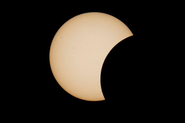 This image shows a partial solar eclipse captured in Hemiksem on %datetext. The moon will cover about 90% of the sun during this solar eclipse. %PHOTOGRAPHER  TomxGoyvaerts 183229310