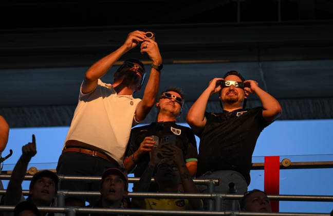 International Soccer: 2026 UEFA Super Cup in Salzburg, August 12, 2026—Paris Saint-Germain and Aston Villa fans at the stadium in Salzburg watch the solar eclipse, the astronomical spectacle of the year