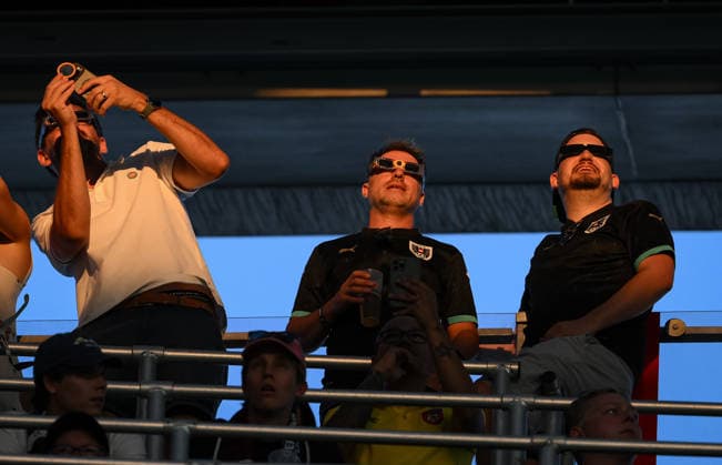 International Soccer: 2026 UEFA Super Cup in Salzburg, August 12, 2026—Paris Saint-Germain and Aston Villa fans at the stadium in Salzburg watch the solar eclipse, the astronomical spectacle of the year