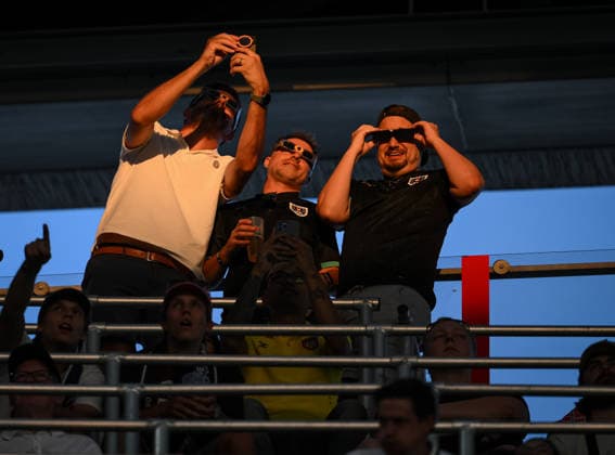International Soccer: 2026 UEFA Super Cup in Salzburg, August 12, 2026—Paris Saint-Germain and Aston Villa fans at the stadium in Salzburg watch the solar eclipse, the astronomical spectacle of the year