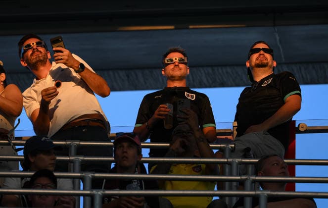 International Soccer: 2026 UEFA Super Cup in Salzburg, August 12, 2026—Paris Saint-Germain and Aston Villa fans at the stadium in Salzburg watch the solar eclipse, the astronomical spectacle of the year
