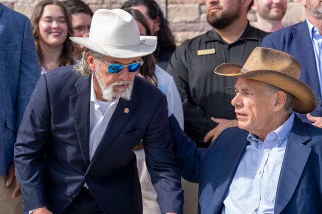 August 12, 2026, San Marcos, Tx, United States: Texas Governor GREG ABBOTT, right is assisted by founder ARCH BEAVER APLIN during the opening of another 76,000 square foot Buc-ee s convenience store in San Marcos, Texas on August 12, 2026. The store features beaver-themed merchandise, lots of food choices and 124 gas pumps. San Marcos United States - ZUMAd150 20260812_znp_d150_005 Copyright: xBobxDaemmrichx