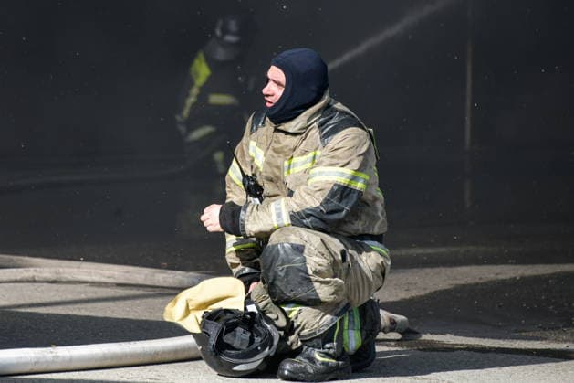 RUSSIA, KRASNODAR REGION - AUGUST 12, 2026: An employee of the Russian Emergencies Minsitry responds to a fire at a warehouse storing plastic products in the village of Lenina, southeast of Krasnodar. The fire covering an area of 2.2 thousand sq m has been contained. Roman Sokolov TASS  96070010
