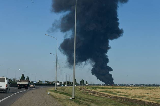 RUSSIA, KRASNODAR REGION - AUGUST 12, 2026: Smoke billows over a warehouse storing plastic products, hit by fire in the village of Lenina, southeast of Krasnodar. The fire covering an area of 2.2 thousand sq m has been contained. Roman Sokolov TASS  96069786