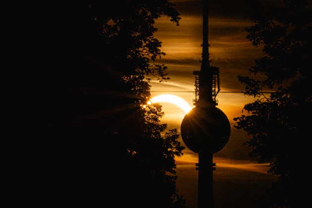 The solar eclipse is visible in the evening sky next to the TV tower in Berlin, August 12, 2026, Berlin, Germany Copyright: xJulianexSonntagx