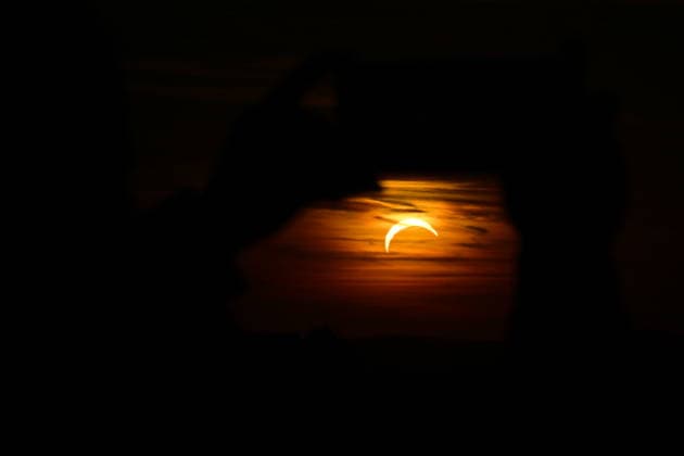 People observe partial solar eclipse in Brno, Czech Republic, August 12, 2026. (CTKxPhoto VaclavxSalek) CTKPhotoP2026081206709  CTKPhotoP2026081206709