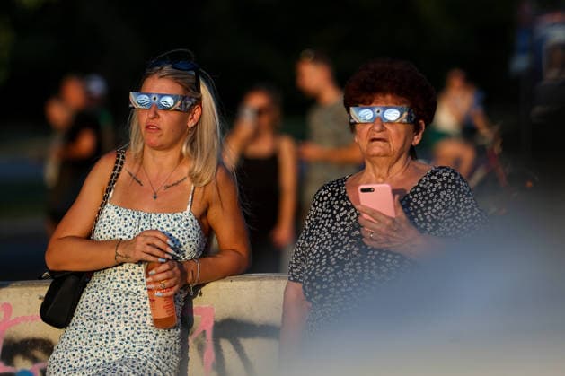 Solar eclipse in Croatia People watch the moon partially covers the sun during a solar eclipse in Zagreb, Croatia, August 12, 2026  IgorxKralj PIXSELL