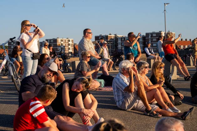 (260812) -- KATWIJK, Aug. 12, 2026 -- People observe solar eclipse in Katwijk, the Netherlands on Aug. 12, 2026. (Photo by Monique Shaw Xinhua) THE NETHERLANDS-KATWIJK-SOLAR ECLIPSE? ShaoxHaijun 