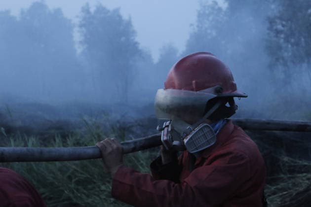 Peatland Fire In South Sumatra Members of the Manggala Agni team work to extinguish a fire at a peatland site in Palm Raya Village, Inderalaya District, South Sumatra, on August 13, 2026. Inderalaya Indonesia  Copyright: xSigitxPrasetyax originalFilename: prasetya-notitle260813_np0Cs.jpg