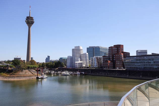August 13, 2026, Germany, North Rhine-Westphalia, Weather, Heat, Rivers, Low Water Levels, Drought, Due to the heat, the water level of the Rhine in Düsseldorf s Medienhafen has dropped significantly; Rhine Tower, Gehry Building, Germany Copyright: xD.xKerlekin SnowfieldxPhotographyx SF130826HafenD6