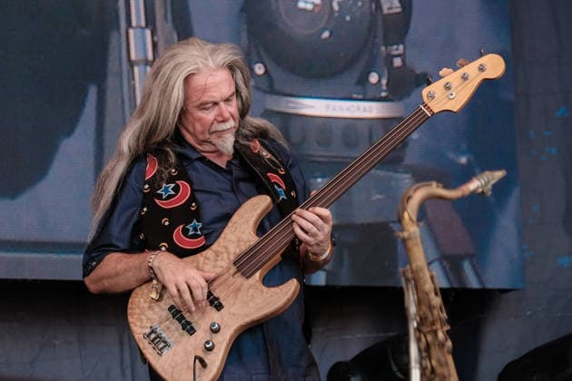August 13, 2026, Williamscot, Oxfordshire, United Kingdom: Guitarist and jazz bass guitarist, Fred Thelonious Baker of English progressive rock band Soft Machine performs live on stage at Fairport Convention s Cropredy festival. The jazz-rock band was formed during 1966 in Canterbury, Kent. The current line-up consists of guitarist John Etheridge, multi-instrumentalist Theo Travis, bassist Fred Thelonious Baker and drummer Asaf Sirk. Williamscot United Kingdom - ZUMAs197 20260813_aaa_s197_270 Copyright: xDawnxFletcher-Parkx