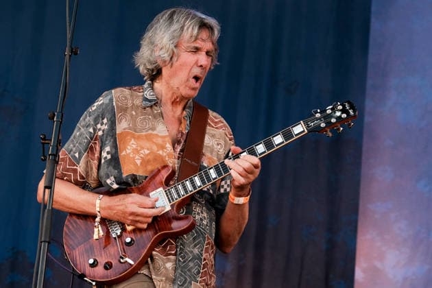 August 13, 2026, Williamscot, Oxfordshire, United Kingdom: British guitarist, composer, bandleader and educator, John Michael Glyn Etheridge of English progressive rock band Soft Machine performs live on stage at Fairport Convention s Cropredy festival. The jazz-rock band was formed during 1966 in Canterbury, Kent. The current line-up consists of guitarist John Etheridge, multi-instrumentalist Theo Travis, bassist Fred Thelonious Baker and drummer Asaf Sirk. Williamscot United Kingdom - ZUMAs197 20260813_aaa_s197_275 Copyright: xDawnxFletcher-Parkx
