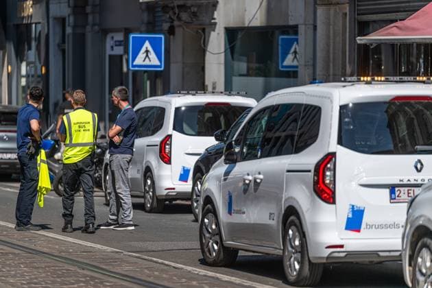 Emergency services pictured on the site of an explosion at the Treurenberg in the city center of Brussels, Friday 14 August 2026. According to the first information, two explosion happened in a building which was evacuated earlier in the day after a gas leak was detected, injuring two people.  EMILExWINDAL 1081058044st