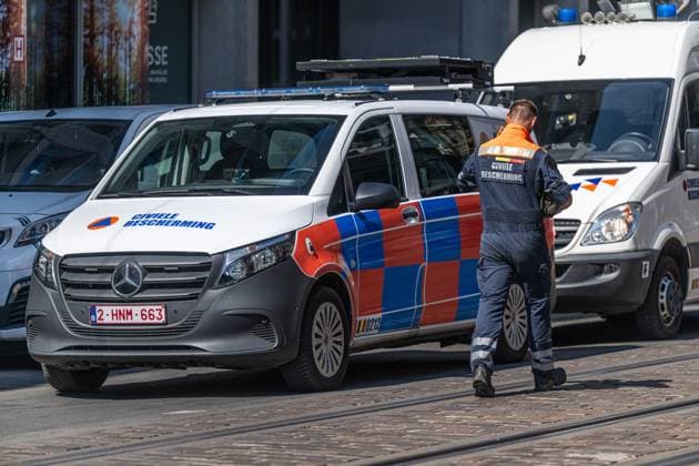 Emergency services pictured on the site of an explosion at the Treurenberg in the city center of Brussels, Friday 14 August 2026. According to the first information, two explosion happened in a building which was evacuated earlier in the day after a gas leak was detected, injuring two people.  EMILExWINDAL 1081058053st