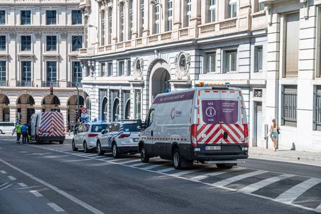 Emergency services pictured on the site of an explosion at the Treurenberg in the city center of Brussels, Friday 14 August 2026. According to the first information, two explosion happened in a building which was evacuated earlier in the day after a gas leak was detected, injuring two people.  EMILExWINDAL 1081058058st