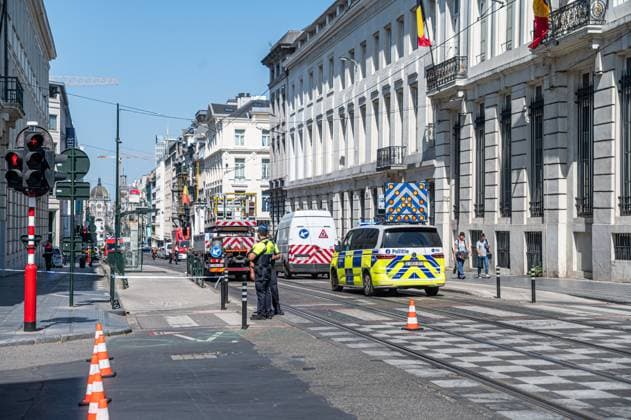 Emergency services pictured on the site of an explosion at the Treurenberg in the city center of Brussels, Friday 14 August 2026. According to the first information, two explosion happened in a building which was evacuated earlier in the day after a gas leak was detected, injuring two people.  EMILExWINDAL 1081058060st
