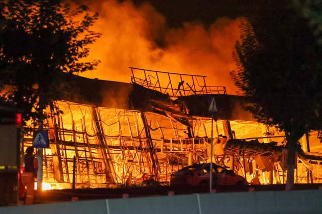 RUSSIA, DONETSK PEOPLE S REPUBLIC - AUGUST 13, 2026: A fire breaks out after a Ukrainian drone strike on the Galaktika Galaxy shopping centre in Yenakiyevo, northeast of Donetsk. Dmitry Yagodkin TASS  96146236