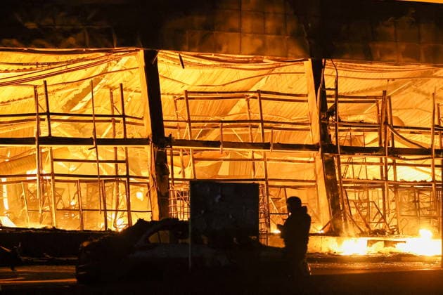 RUSSIA, DONETSK PEOPLE S REPUBLIC - AUGUST 13, 2026: A fire breaks out after a Ukrainian drone strike on the Galaktika Galaxy shopping centre in Yenakiyevo, northeast of Donetsk. Dmitry Yagodkin TASS  96146237