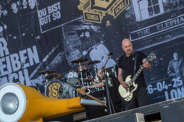 The German punk rock band Sondaschule on the Main Stage at Highfield 2026: Vocals: Costa Cannabis; Tim Kleinrensing: Guitar, Vocals: Chemokeule, Mirko Klautmann; Bass: Matthias Richter (since 2013); Trombone: Chris Altmann (since 2006); Guitar: Phillip FaF Pfaff (since 2022); Highfield 2026, Day 1: Sondaschule