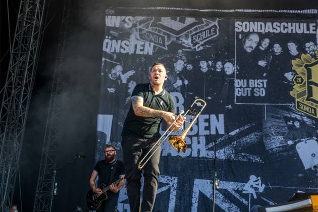 The German punk rock band Sondaschule on the Main Stage at Highfield 2026: Vocals: Costa Cannabis; Tim Kleinrensing: Guitar, Vocals: Chemokeule, Mirko Klautmann; Bass: Matthias Richter (since 2013); Trombone: Chris Altmann (since 2006); Guitar: Phillip FaF Pfaff (since 2022); Highfield 2026; Sondaschule