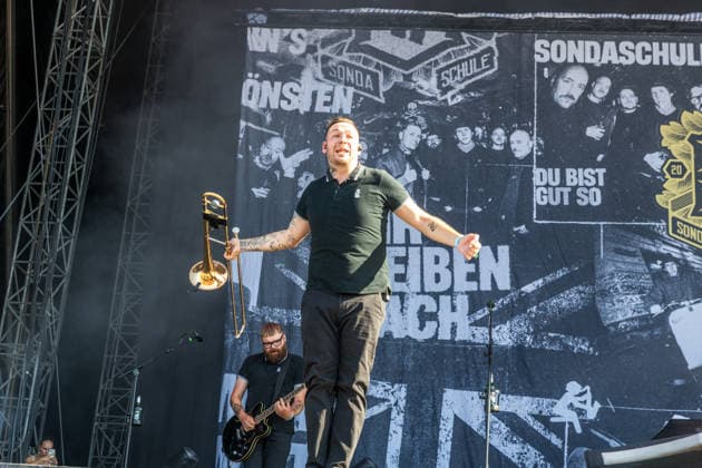 The German punk rock band Sondaschule on the Main Stage at Highfield 2026: Vocals: Costa Cannabis; Tim Kleinrensing: Guitar, Vocals: Chemokeule, Mirko Klautmann; Bass: Matthias Richter (since 2013); Trombone: Chris Altmann (since 2006); Guitar: Phillip FaF Pfaff (since 2022); Highfield 2026; Sondaschule