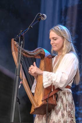 August 14, 2026, Williamscot, Oxfordshire, United Kingdom: Harpist and vocalist Hattie Webb, with Marshall Gilmour Webbs, performing live on stage at Fairport s Cropredy Convention. Williamscot United Kingdom - ZUMAs197 20260814_aaa_s197_098 Copyright: xDawnxFletcher-Parkx
