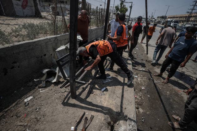 Israel launches airstrike on Gaza despite ceasefire DEIR AL-BALAH, GAZA, PALESTINE - AUGUST 15: Palestinians inspect the area following an Israeli drone strike on a motorcycle along Salah al-Din Street in Deir al-Balah in the central Gaza, Palestine, on August 15, 2026. Ali Jadallah Anadolu Deyr Balah Palestinian Territory, Occupied. Editorial use only. Please get in touch for any other usage.  Copyright: x2026xAnadoluxAlixJadallahx
