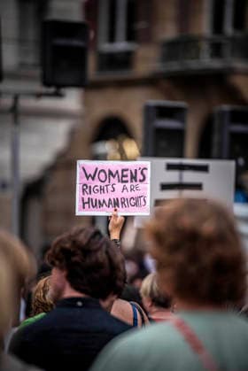 August 15, 2026, Amsterdam, North Holland, The Netherlands Holland: A demonstrator holds a sign reading Ã¢â‚¬oeWomen s Rights are Human RightsÃ¢â‚¬Â. August 15, 2026, Amsterdam, The Netherlands. Demonstrators gathered on Dam Square, Amsterdam, in solidarity with Afghan women and girls. The protest marked five years of Taliban rule and demanded access to education for women and girls be restored, and an end to Brussels engagement with the Taliban regime. Amsterdam The Netherlands Holland  - ZUMAp202 20260815_zip_p202_020 Copyright: xJamesxPetermeierx