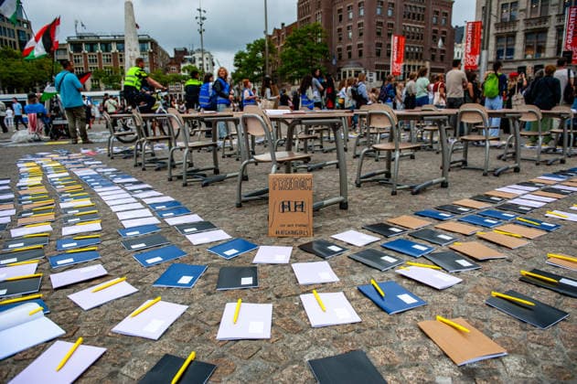 Protesters in Amsterdam rally against five years of Taliban governance - 15 Aug 2026 A placard asking for freedom for the Afghan girls is surrounded by empty desks during the rally. On the fifth anniversary of the Taliban’s capture of Kabul, in Afghanistan, several organizations held a demonstration to demand that the Netherlands and the EU stop legitimizing the Taliban and prioritize the rights of Afghan women. Under the Taliban, girls are barred from education beyond primary school, and women are banned from many jobs. There are laws dictating that women must cover their faces in public and forbidding them from entering public parks. Human rights groups call it gender apartheid. Amsterdam Netherlands Copyright: xAnaxFernandezx xSOPAxImagesx Ana_Fernandez_15082026_ProtestAgainst5yearsTalibanHeldAmsterdam_010