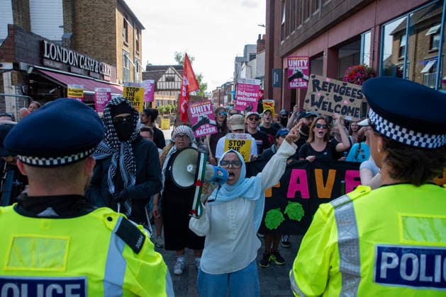 Britain First demo in Maidstone, UK - 15 Aug 2026 Anti-fascists hold placards and chant slogans during a demonstration. Around 150 supporters of the Britain First far-right party gathered in Maidstone, UK. The protesters marched through at the town centre led by Paul Golding the current leader of the party. Far-right campaigners were confronted by a group of anti-fascist counter-protesters on the way to the County Hall. Maidstone United Kingdom Copyright: xKrisztianxElekx xSOPAxImagesx SSS_20260815_COUNTER_PROTEST_0011005021