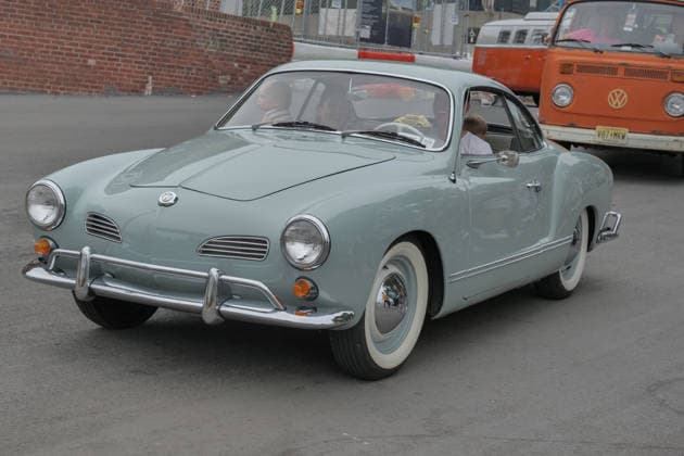 August 16, 2026, New York, New York, USA: Karmann Ghia at VW Gridlock on Governors Island. The vintage Volkswagen show returned to .the island across from the Lower Manhattan skyline. The collection of about 75 vintage epic.Volkswagens from across the years with models the Beetle, Bus, Karmann Ghia and Thing .were parked along the waterside at Picnic Point for visitors to enjoy, admire and photograph. New York USA - ZUMAh156 20260816_znp_h156_014 Copyright: xMiloxHessx