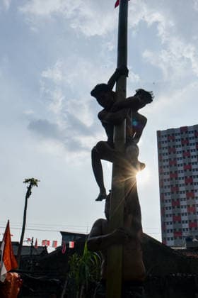 August 17, 2026, Bandung Regency, West Java, Indonesia: Participants climb a pole coated in oil and mud, with prizes placed at the top, during a competition locally known as Panjat Pinang to commemorate the 81st anniversary of the Republic of Indonesia s independence in Lengkong Village, Bandung Regency, Indonesia. Bandung Regency Indonesia - ZUMAr272 20260817_zip_r272_020 Copyright: xDimasxRachmatsyahx