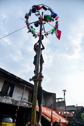 August 17, 2026, Bandung Regency, West Java, Indonesia: Participants climb a pole coated in oil and mud, with prizes placed at the top, during a competition locally known as Panjat Pinang to commemorate the 81st anniversary of the Republic of Indonesia s independence in Lengkong Village, Bandung Regency, Indonesia. Bandung Regency Indonesia  - ZUMAr272 20260817_zip_r272_022 Copyright: xDimasxRachmatsyahx