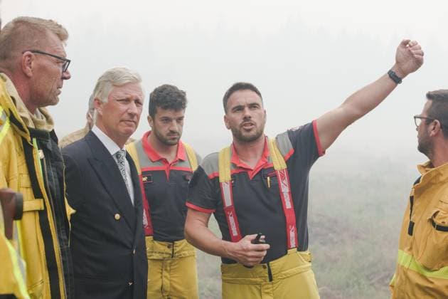 King Philippe - Filip of Belgium pictured a visit of Belgian king at the command center in Sourbrodt, as fire rages in the Hautes Fagnes (High Fens) nature reserve, on Monday 17 August 2026. The fire started on August 14th and 3000 hectares (on a total of 4500) are impacted. POOL  NICOLASxLAMBERT 183612593