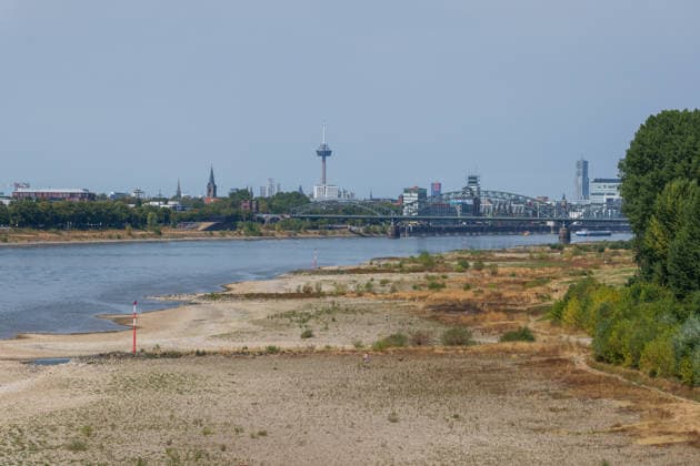 Record-Low Water Level on the Rhine: View of Cologne from the Rodenkirchen Bridge, August 16, 2026. View of the Cologne skyline from the Rhine Bridge (Cologn Copyright: xMarcxJohnx