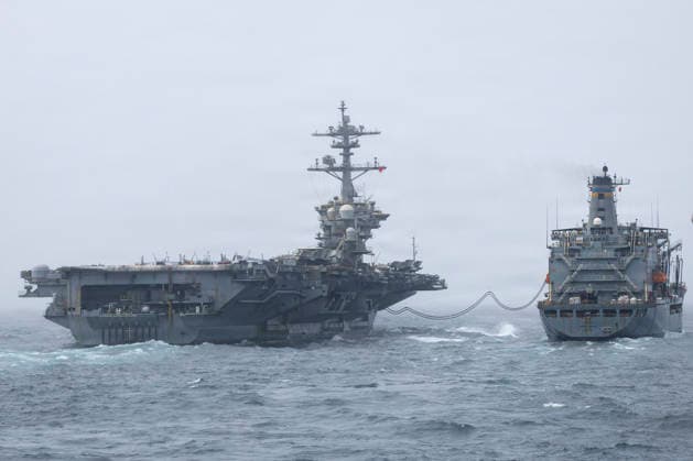 August 18, 2026, Undisclosed Location, United States: The U.S. Navy Nimitz-class aircraft carrier USS Abraham Lincoln conducts a replenishment-at-sea with fleet replenishment oiler USNS Henry J. Kaiser, right, during Operation Epic Fury, August 16, 2026, from an undisclosed location. The Lincoln is in its ninth month at sea and has been deployed for more than 260 days. Undisclosed Location United States - ZUMAp138 20260818_zaa_p138_042 Copyright: xUsxNavy U.S.xNavyx