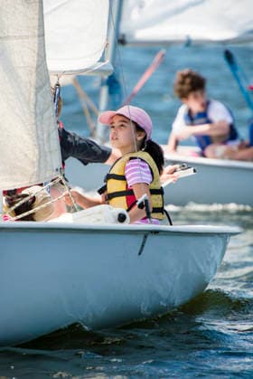 Focused young girl learning to sail a dinghy Providence, Rhode Island, United States CR_CABR260812-2105395-01 ,model released, Symbolfoto ,property released