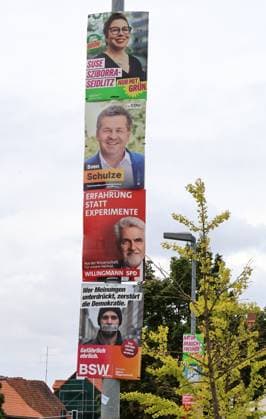 Election posters, August 18, 2026, Aschersleben, election posters for the state election on September 6, 2026, in Saxony-Anhalt shown here: election posters stacked on top of each other on a lamppost, featuring Alliance ’90 The Greens’ Suse Sziborra Seidlitz ( Only with the Greens ), CDU’s Sven Schulze, SPD: Experience Instead of Experiments —Dr.