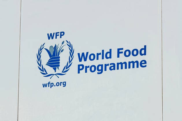 WFP logo and World Food Programme lettering; WFP logo and World Food Programme lettering, July 4, 2026, Munich, Bavaria; A WFP company sign features a logo and the lettering World Food Programme