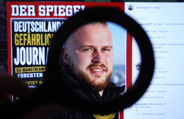 On a laptop, the Instagram channel of Matthäus Westfal, also known as Aktivist Mann, was opened. A magnifying glass points to a parody cover he designed for the news magazine *Der Spiegel*, bearing the headline Germany’s Most Dangerous Journa