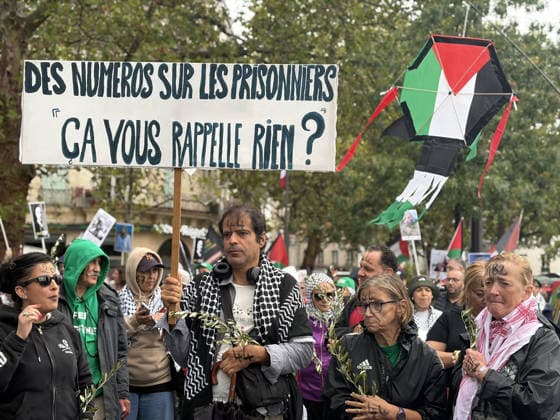 Pro-Palestinian demonstrators march through rain in Paris holding olive branches and kites PARIS, FRANCE - AUGUST 29: Demonstrators hold olive branches and kites while marching through heavy rain near Place de la Bastille in central Paris, France, on August 29, 2026. Gathering despite inclement weather, pro-Palestinian activists paraded toward the historic Fontaine des Innocents, displaying olive branches as symbols of peace and flying kites to draw international attention to the humanitarian crisis in Gaza while demanding an immediate ceasefire and the lifting of blockades. Esra Taskin Anadolu Paris France. Editorial use only. Please get in touch for any other usage. Copyright: x2026xAnadoluxEsraxTaskinx
