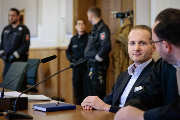 Wind Power Fraudster Hendrik Holt: Wind power fraudster Hendrik Holt (left) and his defense attorney, Maximilian Pancic, await the testimony of for