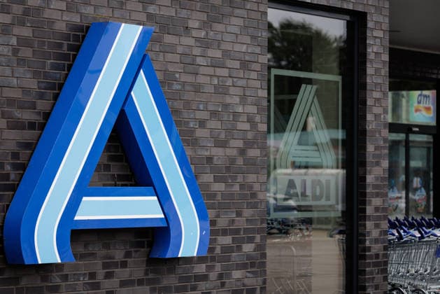 Aldi Nord On August 30, 2026, the blue Aldi Nord logo will illuminate the modern, anthracite-colored clinker brick facade of the Aldi store in Westerkappeln, North Rhine-Westphalia, Germany. Founded in 1946, the retail company now operates an international network of stores and is one of the leading food retailers in Germany and Europe.