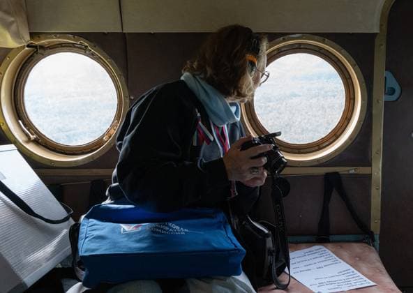 Russia Parliamentary Election Early Voting 9234387 02.09.2026 A member of the Yelizovo Election Commission is seen aboard a helicopter during early voting in remote and hard-to-reach areas for elections to the ninth State Duma and the fifth Kamchatka Regional Legislative Assembly in Kamchatka Territory, Russia. Alexandr Piragis Sputnik Kamchatka Region Russia  Copyright: xAlexandrxPiragisx