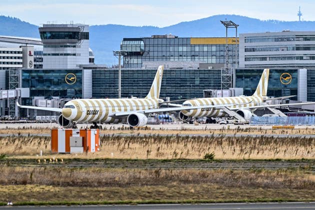 September 3, 2026, xsvx, Travel, Vacation, Economy, emwir, Two Condor A330-900 aircraft featuring the Condor Beach livery, Beach livery, Condor Beach, beige livery, beige and white stripes, Condor striped livery, Condor stripes on the tarmac in Frankfurt (stock photo), stock image of Frankfurt